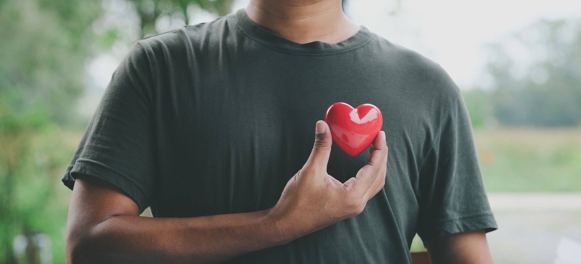 Hand holding red heart, Health care and mental health